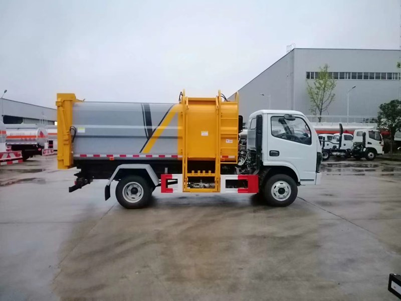 東風(fēng)牌5方6方側(cè)裝壓縮垃圾車(chē)